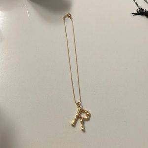 Color Gold R necklace, bamboo detail